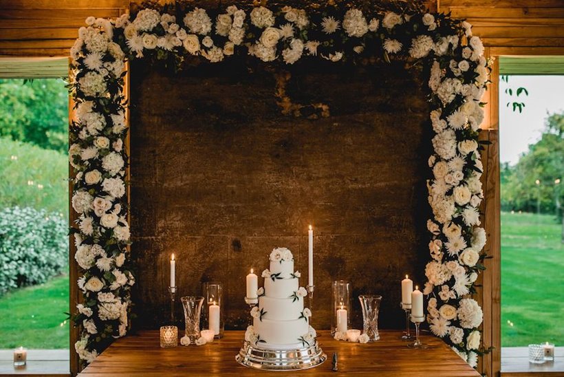 Cake and Flower Arch by Barney Walters