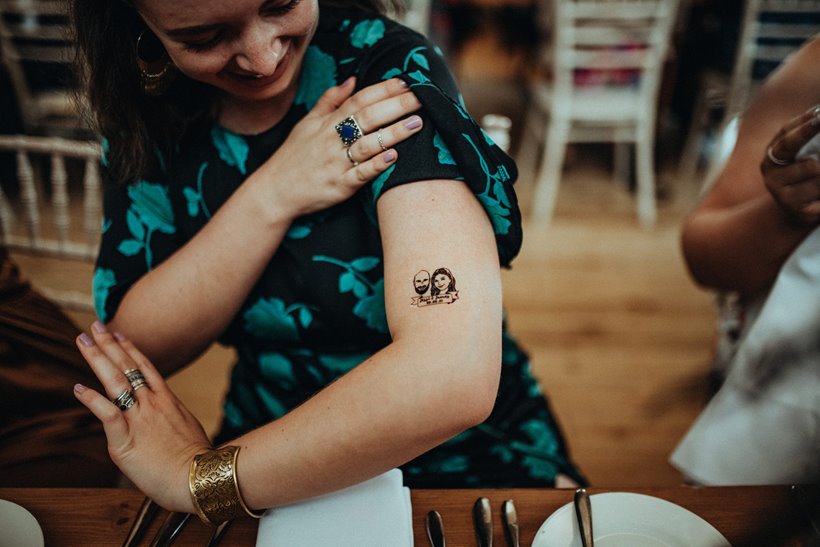 Tattoo wedding with temporary tattoos of bride and groom given as favours