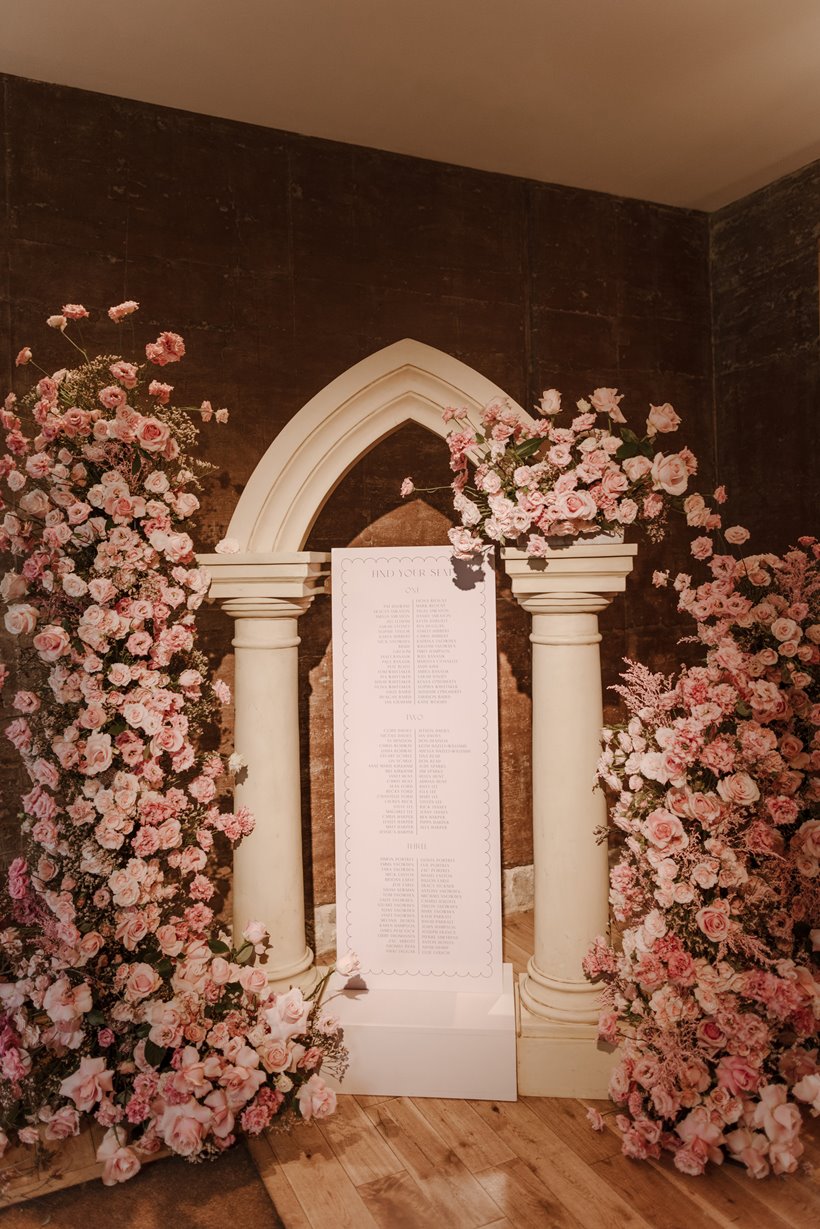 Towers of pink flowers with roman columns