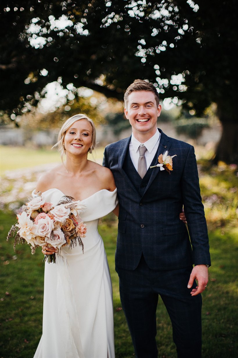 Autumnal wedding couple