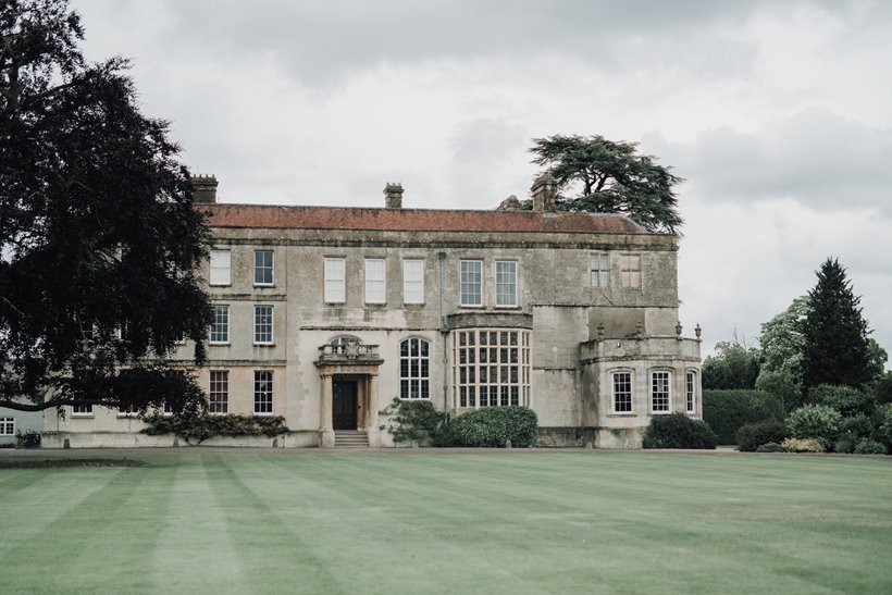 Stately home wedding venue elmore court with lawn and copper beech tree