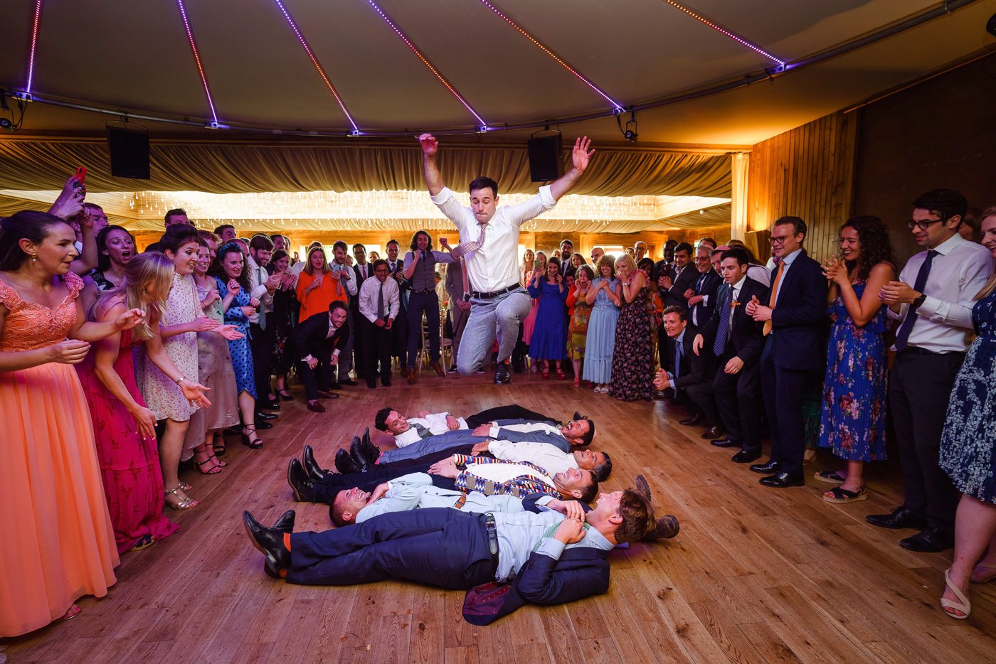 A bold bright Jewish summer wedding with outdoor ceremony