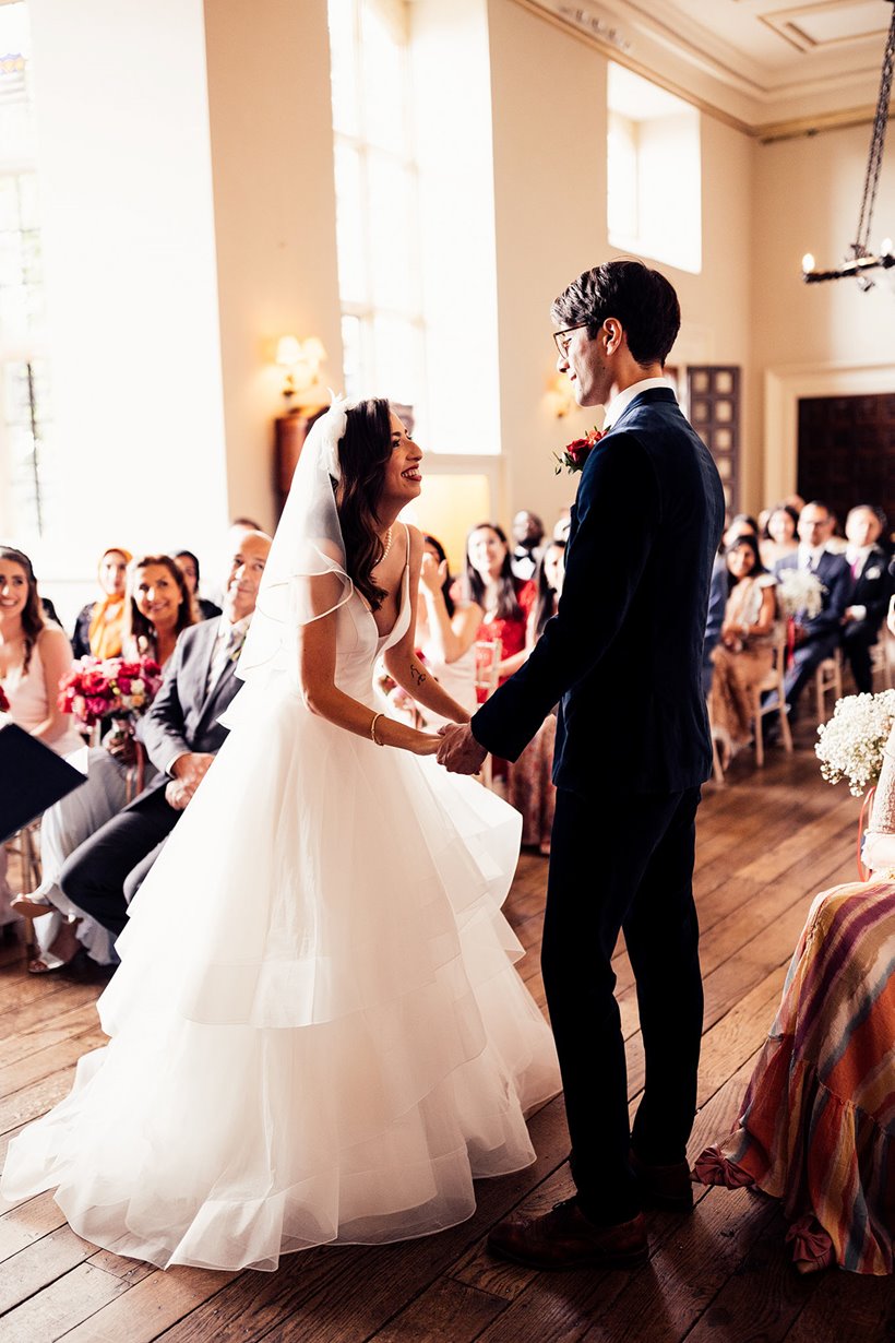 Bride in her ceremony wedding dress, she changed two more times after this into reception dress and after wedding party dress!