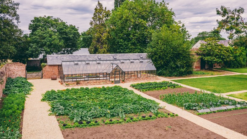 Walled garden for home grown wedding food at sustainable venue elmore court