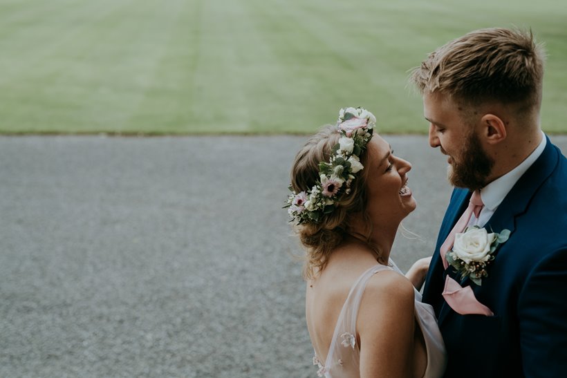 Happy bride and groom just married at micro wedding at elmore court