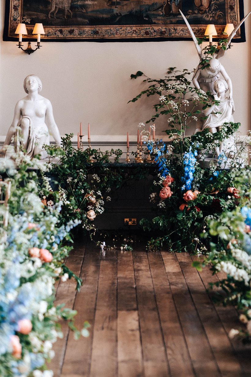 Stunning wedding aisle flowers styling at Elmore Court by Amber Persia