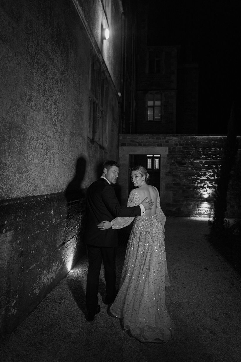 Bride and groom sharing a quiet moment together after getting married at a stately home in Gloucestershire