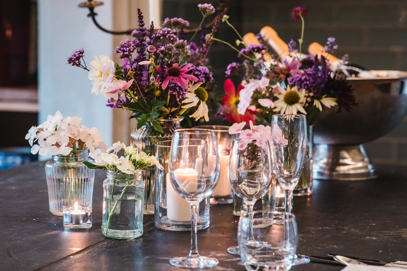 Fresh flowers and candles await you when you have a wedding tasting at elmore court in their newly opened victorian kitchens