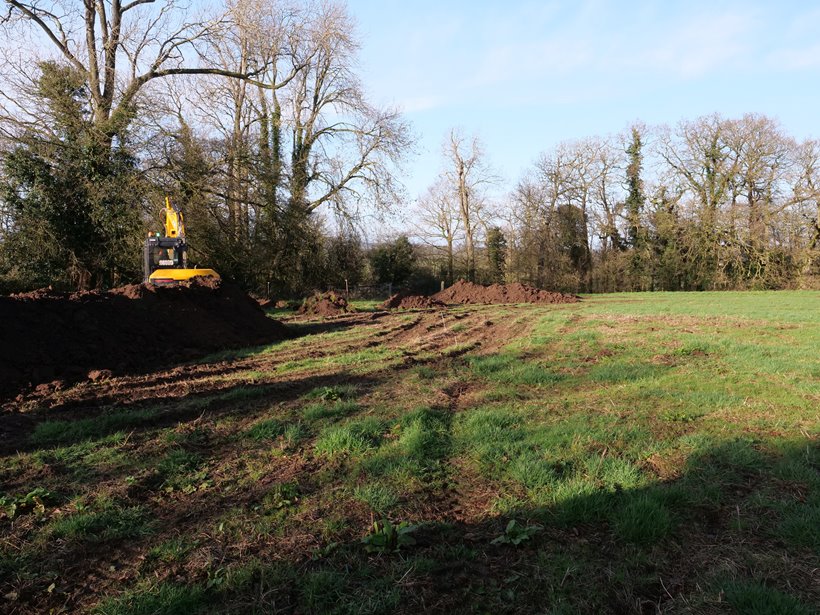 Digging foundations for treehouse rentals on rewilding land at elmore court for treehouse holidays opening 2023