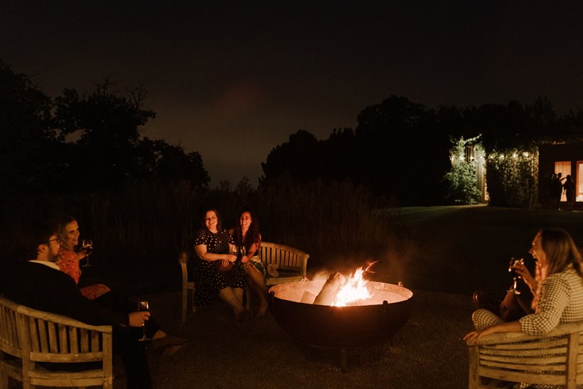 Wedding venue with firepit and real fires for guests to sit around at night in the cotswolds countryside